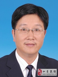 顾建华